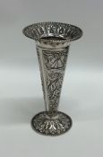 A Dutch silver flower vase decorated with figures.