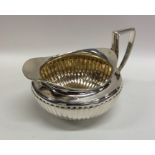 A good Georgian silver and silver gilt squat cream