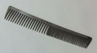 An Edwardian Continental silver comb of tapering f