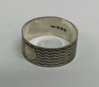 A modern silver napkin ring. Birmingham. By Sampso