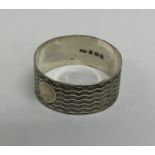 A modern silver napkin ring. Birmingham. By Sampso