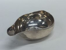 A small Georgian silver pap boat with reeded borde