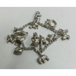 A small child's silver charm bracelet. Approx. 30