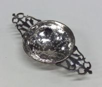 An 18th Century Provincial silver lemon strainer w