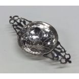 An 18th Century Provincial silver lemon strainer w