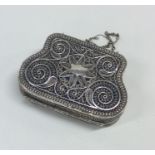A Russian silver filigree purse with fitted interi