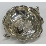 A Continental chased silver bonbon dish with shape