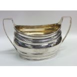 A good Georgian silver boat shaped sugar bowl with