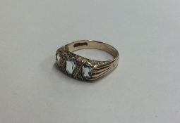 A diamond mounted seven stone ring in 9 carat moun