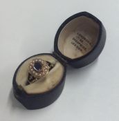 A good gold and enamelled 'In Memory Of' ring with