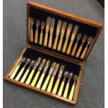 A cased set of twelve (plus twelve) silver mounted