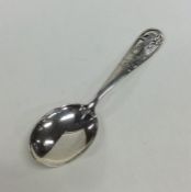 An unusual pierced Continental silver caddy spoon