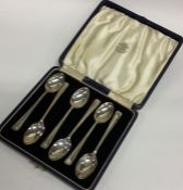 A set of six cast silver Art Deco coffee spoons co