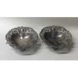 A good pair of Edwardian silver bonbon dishes on s