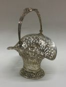 A Continental silver swing handled basket attracti