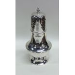 An Edwardian baluster shaped silver caster. Sheffi