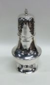 An Edwardian baluster shaped silver caster. Sheffi