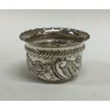 A Victorian silver salt with chased decoration. Ap