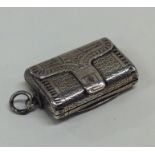 A good Georgian silver purse shaped vinaigrette wi