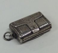 A good Georgian silver purse shaped vinaigrette wi