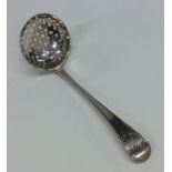 A silver sifter spoon with pierced bowl. London 17