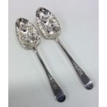 A pair of Scottish silver berry spoons with bright