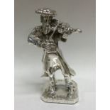 A Sterling silver figure of a man playing a violin