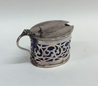 An Edwardian silver pierced mustard pot. Birmingha