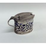 An Edwardian silver pierced mustard pot. Birmingha