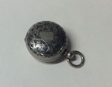 A silver plated sovereign case with engraved decor
