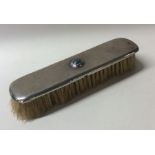 LIBERTY & CO: A small silver hand brush decorated