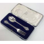 A cased silver two piece christening set. Sheffiel