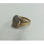 A gent's opal single stone signet ring in rubover