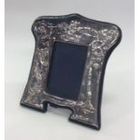 A stylish silver modern picture frame on bracket f