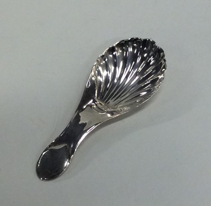 A stylish silver fluted caddy spoon. Chester. By M - Image 2 of 2