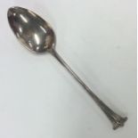 A silver onslow pattern dessert spoon. London. By