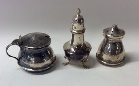 A silver three piece cruet set. Birmingham. Approx