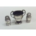 An Edwardian silver trophy cup together with a pai