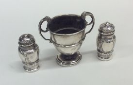 An Edwardian silver trophy cup together with a pai
