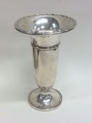 A large tapering silver spill vase with beaded dec