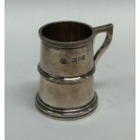 A good quality tapering silver mug with gilt inter