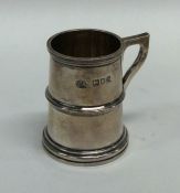 A good quality tapering silver mug with gilt inter