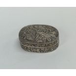 A good quality Chinese silver oval box decorated w