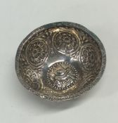 A circular Norwegian silver bowl decorated with a