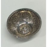 A circular Norwegian silver bowl decorated with a