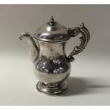 An unusual Antique Spanish silver oil jug with emb