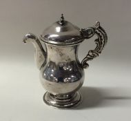 An unusual Antique Spanish silver oil jug with emb