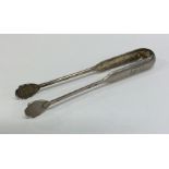 A pair of heavy Russian silver ice tongs. Punched