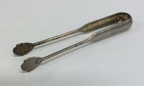 A pair of heavy Russian silver ice tongs. Punched