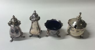 Four silver Adams' style cruets. Various dates and